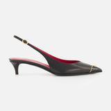 The VALENTINO GARAVANI VLogo Heartip Sling Back Heel is a black leather kitten-heel with a pointed toe, red interior, gold ankle buckle, and gold toe accent—elegantly crafted in Italy.