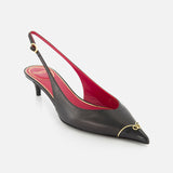 The VALENTINO GARAVANI VLogo Heartip Sling Back Heel is a black Italian leather heel with a pointed toe, low kitten heel, red lining, gold toe accent, and adjustable ankle strap.