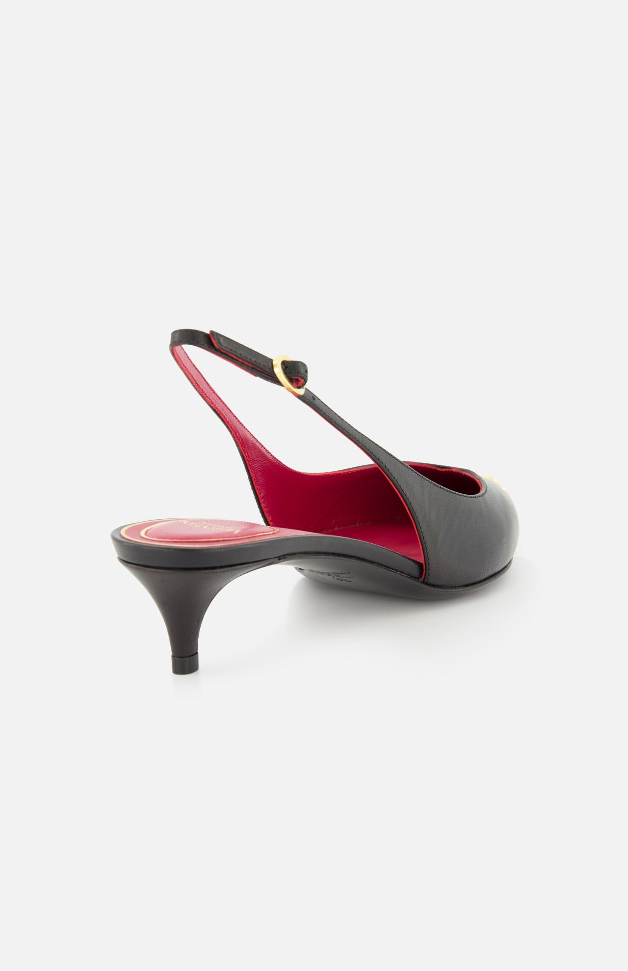The VALENTINO GARAVANI VLogo Heartip Sling Back Heel features black leather, a pointed toe, low kitten heel, and red interior lining. Made in Italy, it's beautifully displayed against a white background.