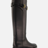 The VALENTINO GARAVANI VLogo Signature Boot is a knee-high black leather riding boot with a low heel, rounded toe, and gold buckle detail near the top—an elegant choice for equestrian style.