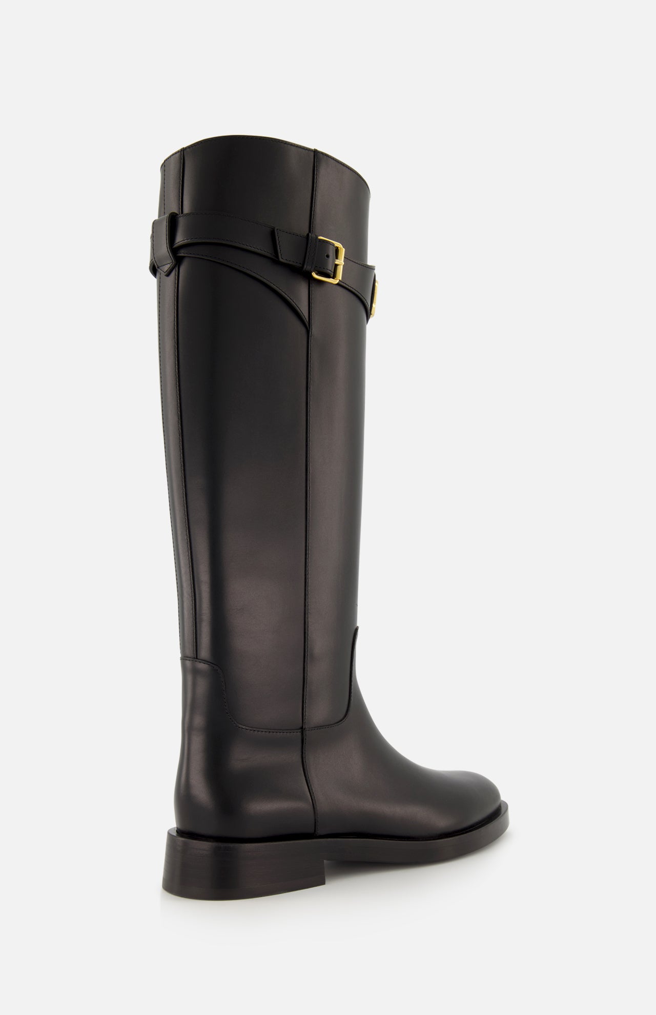 The VALENTINO GARAVANI VLogo Signature Boot is a knee-high black leather riding boot with a low heel, rounded toe, and gold buckle detail near the top—an elegant choice for equestrian style.
