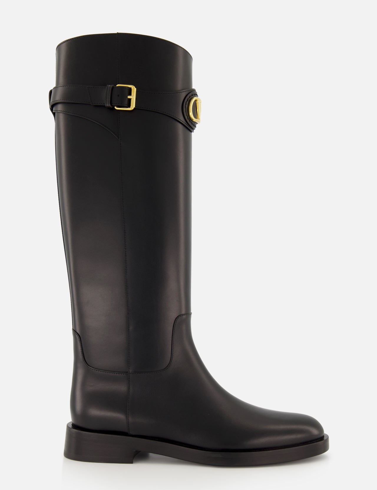 The VALENTINO GARAVANI VLogo Signature Boot is a black knee-high leather riding boot with a low heel, rounded toe, and gold-tone buckle detail at the top, shown against a plain white background.