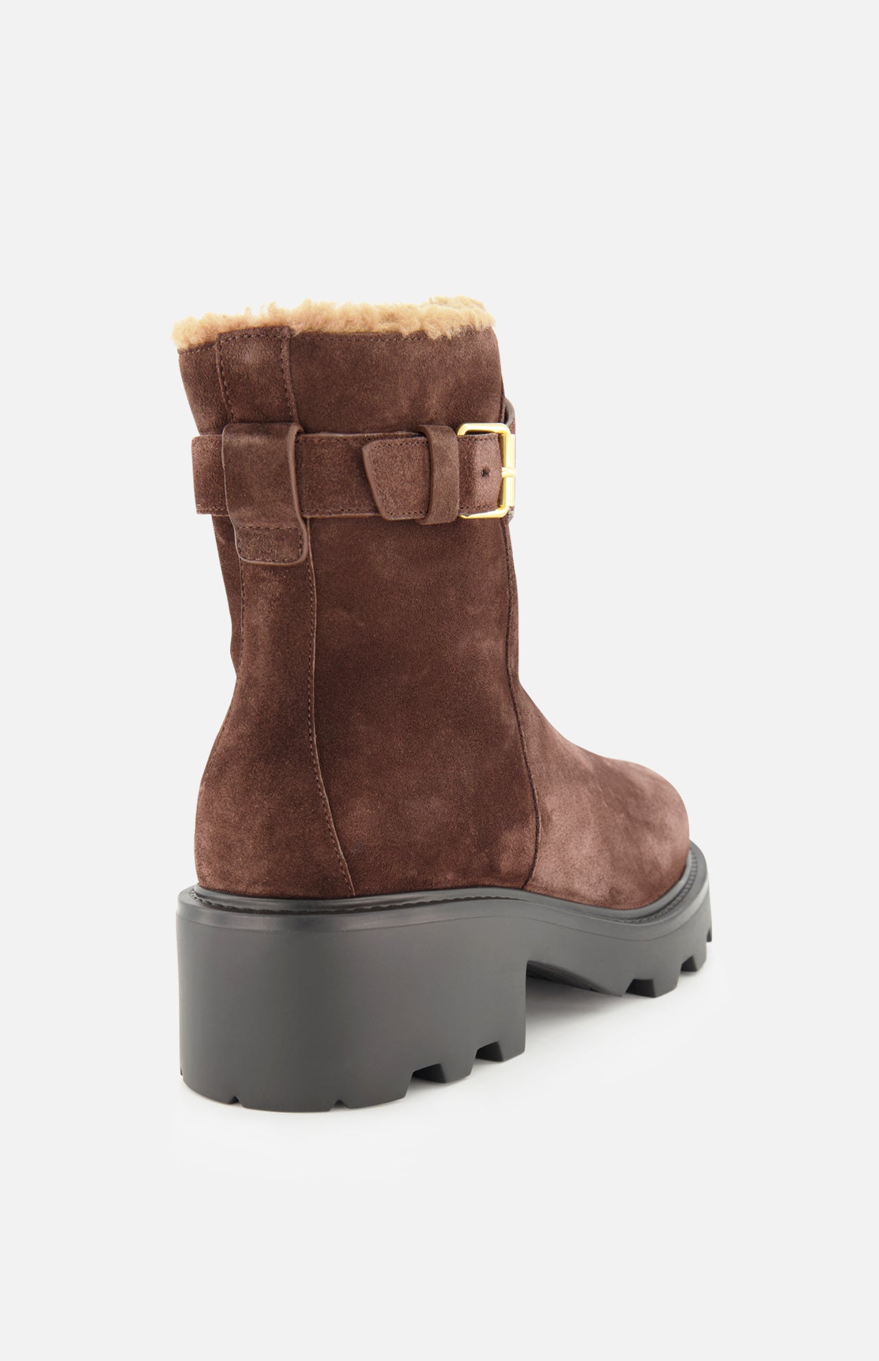 The VALENTINO GARAVANI VLogo Signature Sheepskin Bootie is shown from a rear angle against a plain white background, featuring brown suede, a chunky black sole, gold buckle detail, and visible tan sheepskin lining—making it a stylish addition to your fall boots collection.