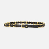 The VALENTINO GARAVANI VLogo Signature Chain Belt H. 12 is a slim black leather belt adorned with striking gold-tone chain links and a signature gold buckle, beautifully showcased against a white background.