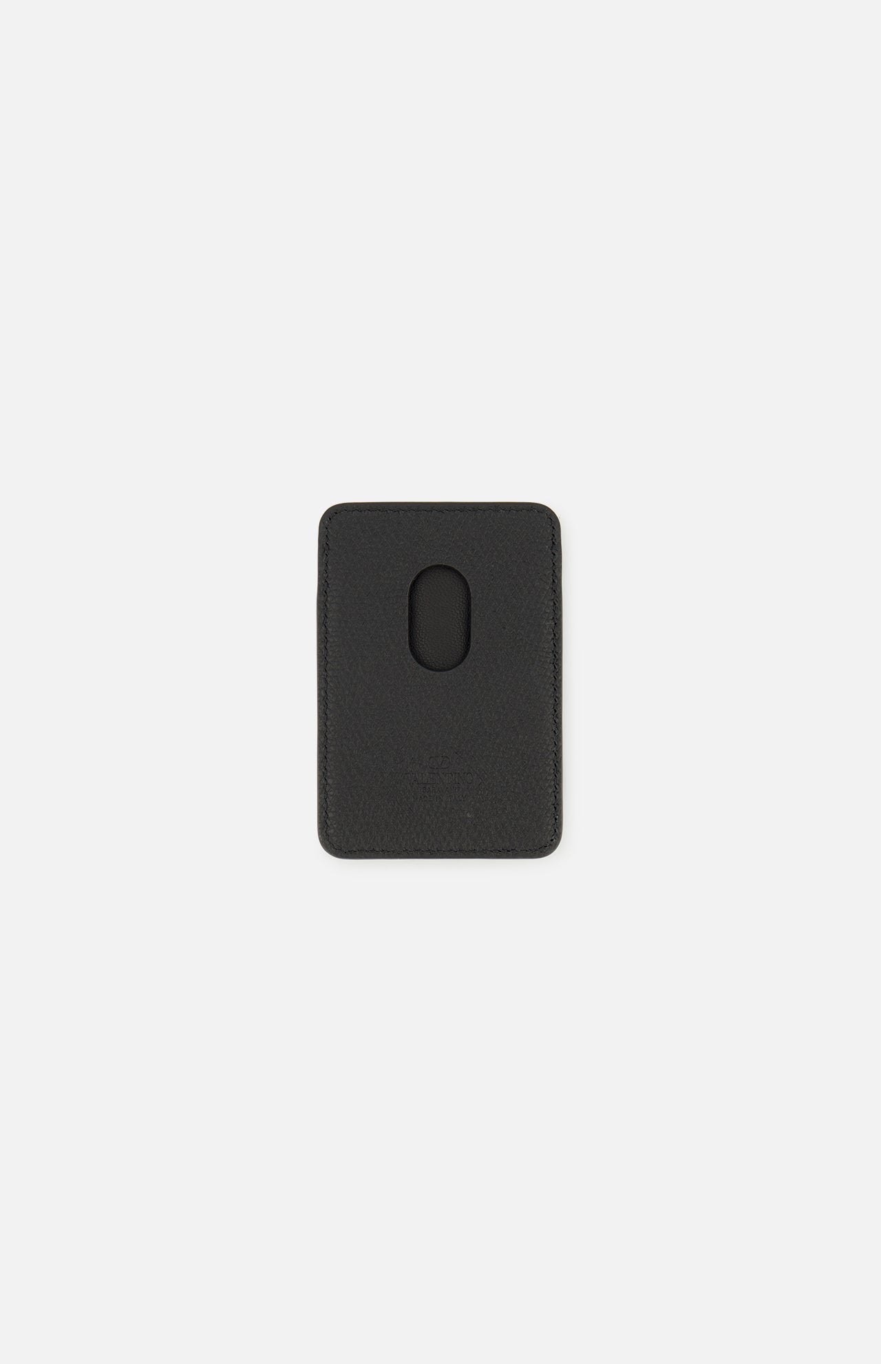 Black magnetic Valentino Garavani VLogo Signature Magnetic Card Holder with a centered oval cutout.