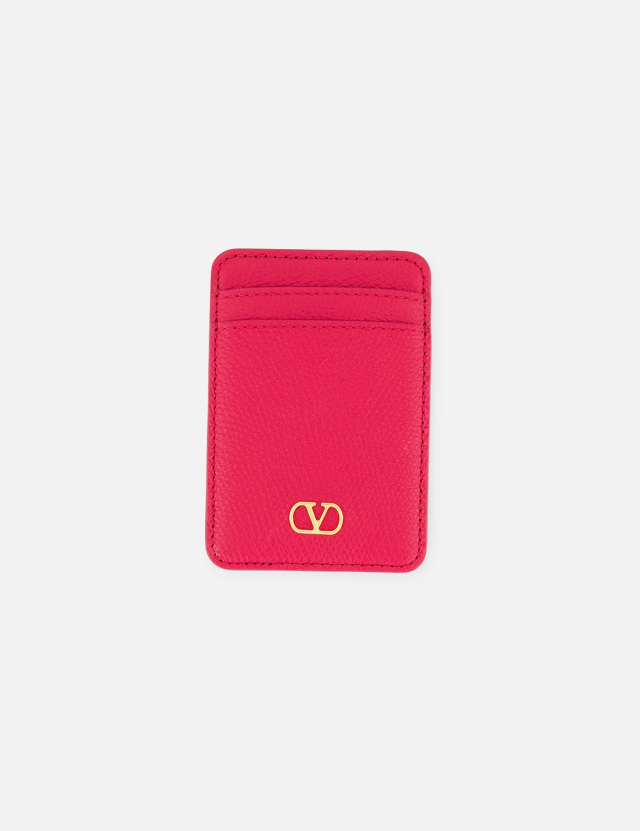 The VALENTINO GARAVANI VLogo Signature Magnetic Card Holder, crafted in bright pink leather, features two card slots and a gold Valentino logo at the bottom center. Displayed on a white background, this elegant accessory combines style and functionality in one chic design.