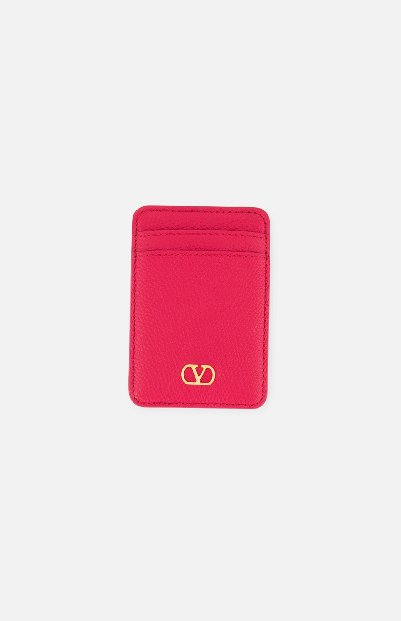 The VALENTINO GARAVANI VLogo Signature Magnetic Card Holder, crafted in bright pink leather, features two card slots and a gold Valentino logo at the bottom center. Displayed on a white background, this elegant accessory combines style and functionality in one chic design.