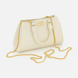 The VLogo Signature Mini Bag by VALENTINO GARAVANI features gold hardware, a gold chain strap, and two short handles. This ivory mini leather bag is elegantly displayed on a white background.