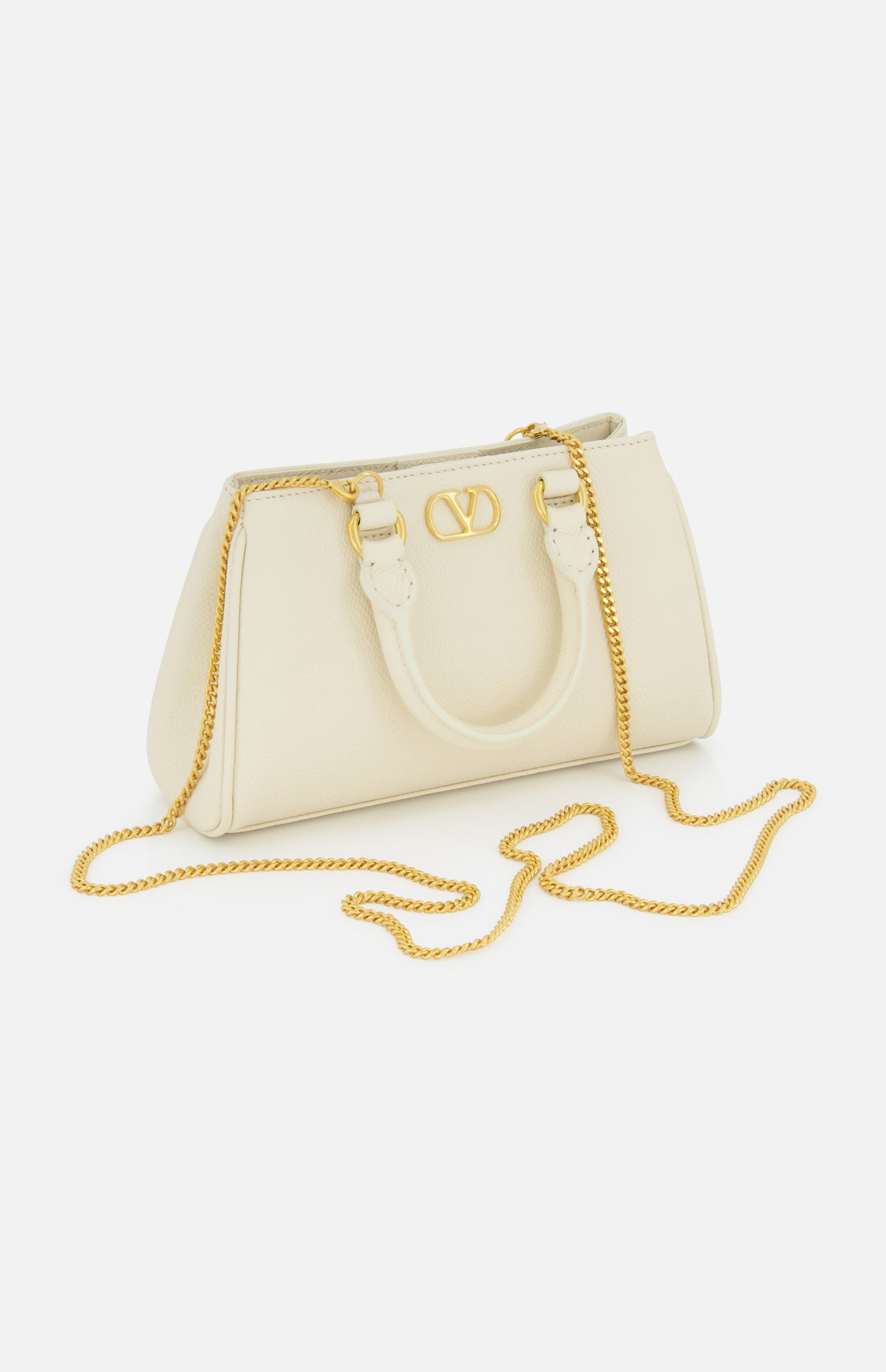 The VLogo Signature Mini Bag by VALENTINO GARAVANI features gold hardware, a gold chain strap, and two short handles. This ivory mini leather bag is elegantly displayed on a white background.