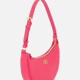 The VALENTINO GARAVANI VLogo Signature Mini Hobo Bag is a vibrant pink, half-moon shaped mini handbag featuring a gold zipper, gold hardware, and a small gold logo on the front. It comes with an adjustable strap and boasts a smooth, textured finish similar to that of red leather.