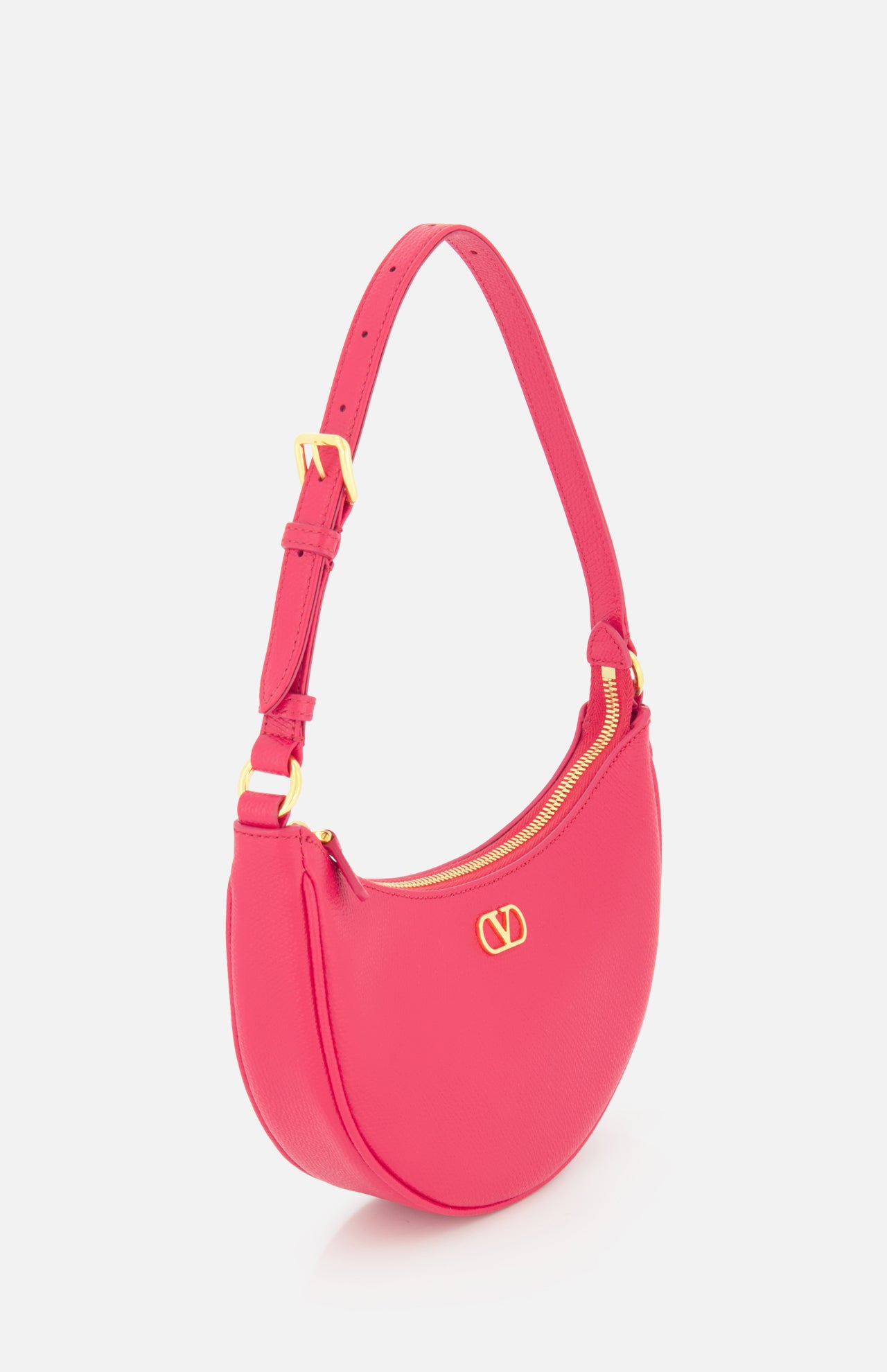 The VALENTINO GARAVANI VLogo Signature Mini Hobo Bag is a vibrant pink, half-moon shaped mini handbag featuring a gold zipper, gold hardware, and a small gold logo on the front. It comes with an adjustable strap and boasts a smooth, textured finish similar to that of red leather.