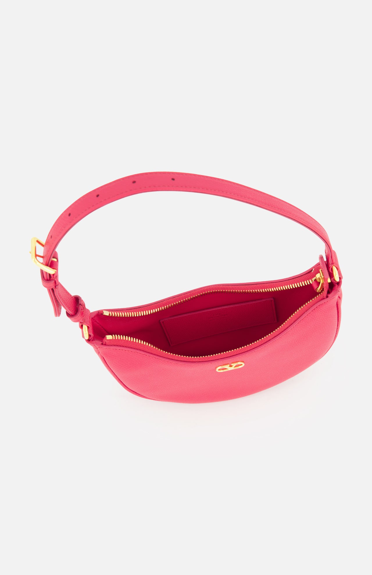 The VALENTINO GARAVANI VLogo Signature Mini Hobo Bag, crafted in bright pink leather with gold hardware and a zippered opening, is displayed on a white background. Evoking the style of a chic mini handbag, its interior—featuring a small inner pocket and an adjustable strap for versatile wear—is visible.
