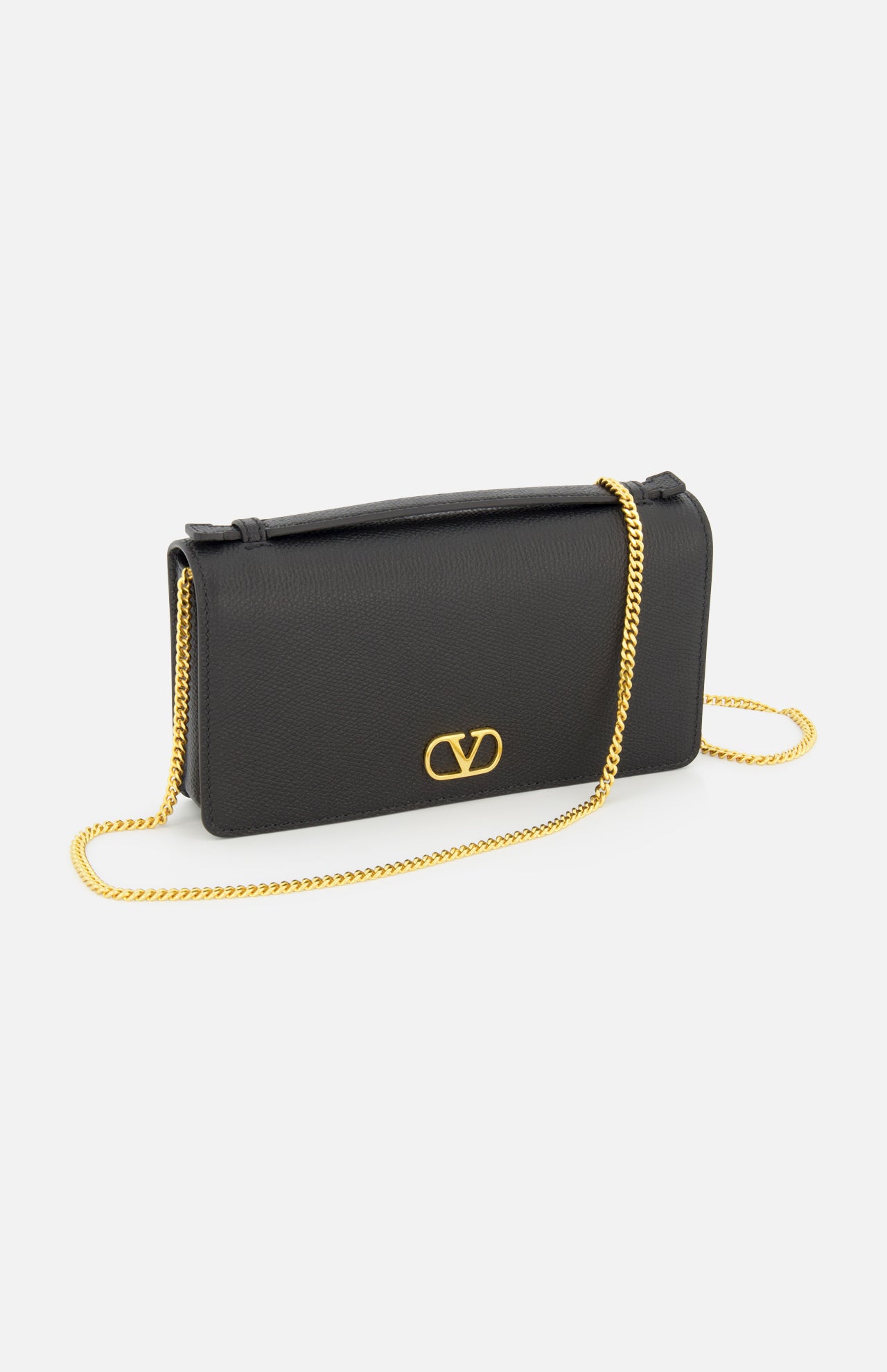 A VALENTINO GARAVANI VLogo Signature Wallet with Strap in black, featuring a rectangular shape, gold chain strap, and an eye-catching VLogo signature on the front, displayed against a white background.