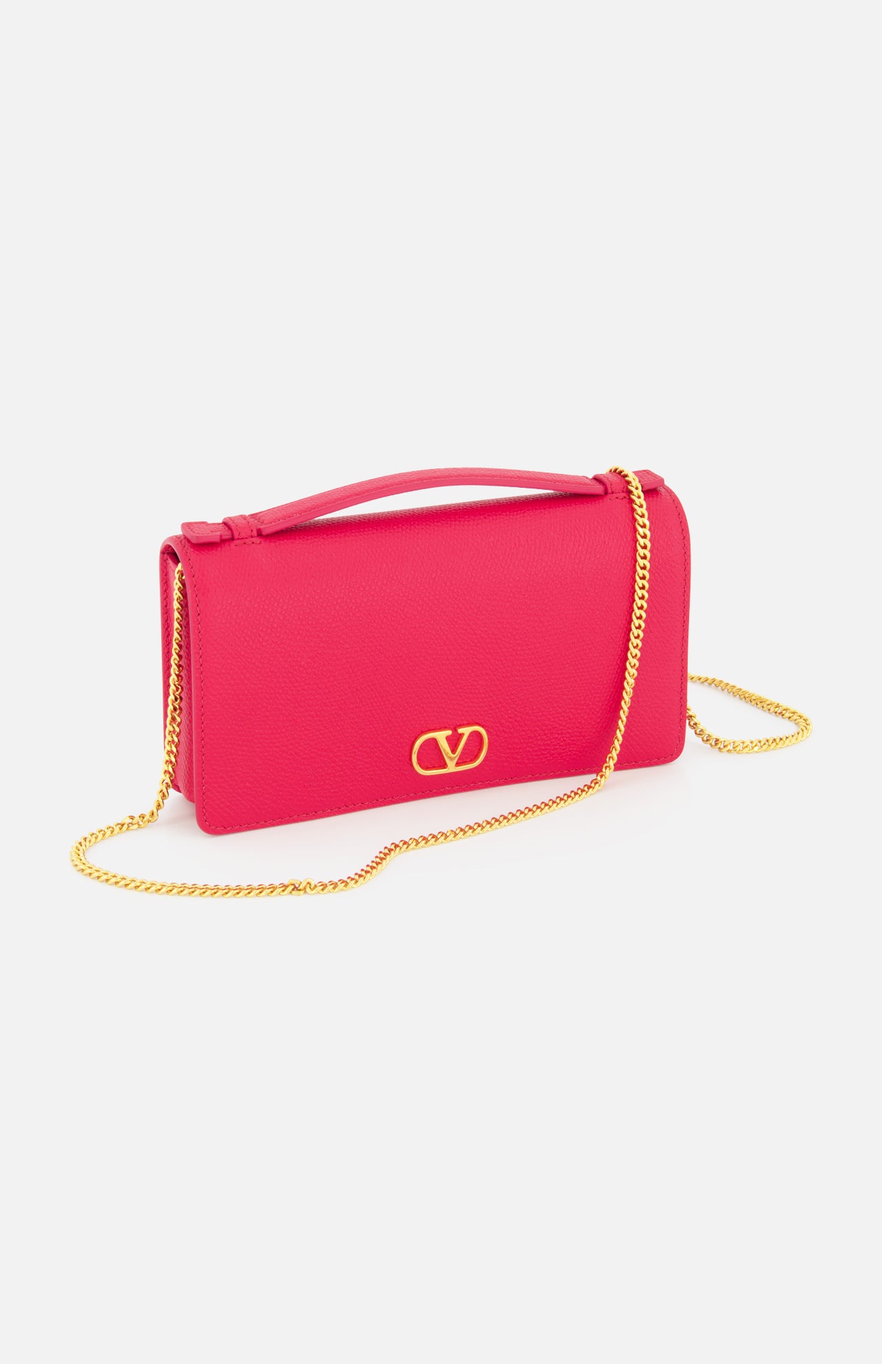 A VALENTINO GARAVANI VLogo Signature Wallet with Strap in bright pink, featuring a gold chain strap and VLogo signature detail on the front, displayed against a plain white background.