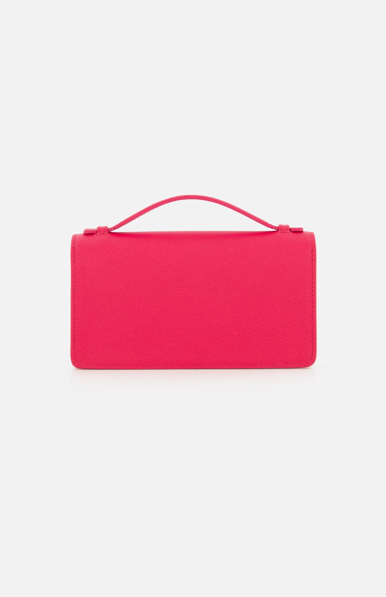 The VLogo Signature Wallet with Strap by VALENTINO GARAVANI is a bright pink rectangular handbag featuring a short top handle, presented against a plain white background. Its simple, minimalist design—free of visible logos or embellishments—offers an elegant alternative to the classic crossbody bag.
