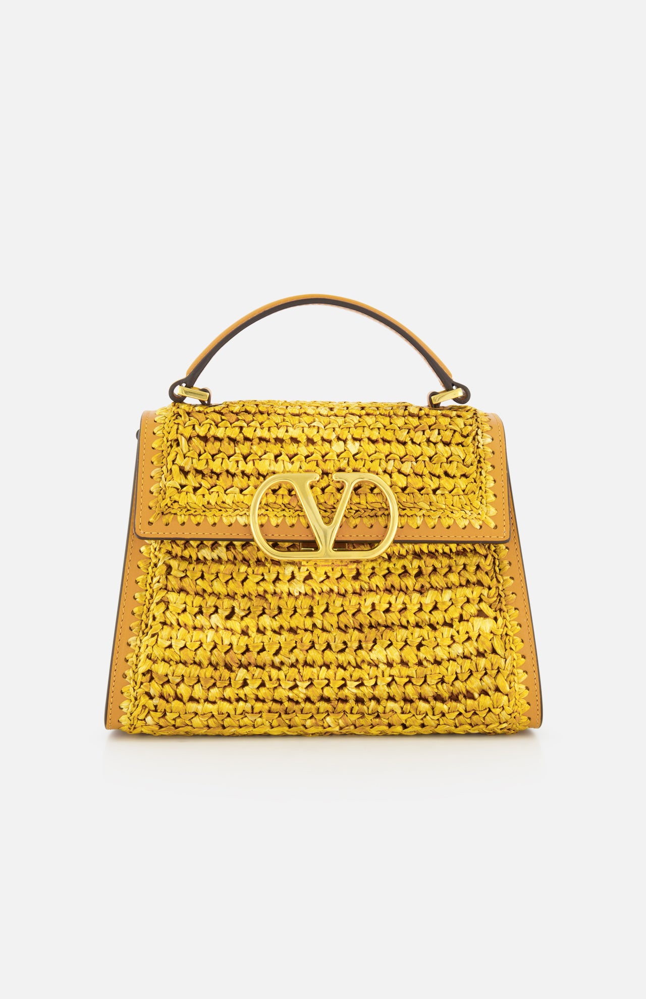 The VALENTINO GARAVANI VSling Small Top Handle Bag, made from yellow raffia-effect fabric with a prominent gold V logo on the front flap, is displayed against a plain white background.