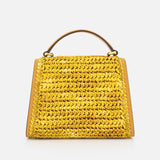 The VALENTINO GARAVANI VSling Small Top Handle Bag features a bright yellow raffia-effect front, light brown leather trim and sides, a structured shape, and a short top handle, shown on a plain white background.