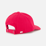The VARSITY HEADWEAR Cotton Twill Pulse Hat is a vibrant red baseball cap made from soft organic cotton. Shown from the back, it features an adjustable strap with a metal buckle and a small rectangular metal accent on the side, blending comfort and style for any occasion.