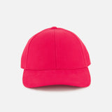 Front view of the Cotton Twill Pulse Hat by VARSITY HEADWEAR in bright red, featuring a curved brim and an adjustable back strap for a comfortable fit, displayed on a plain white background.