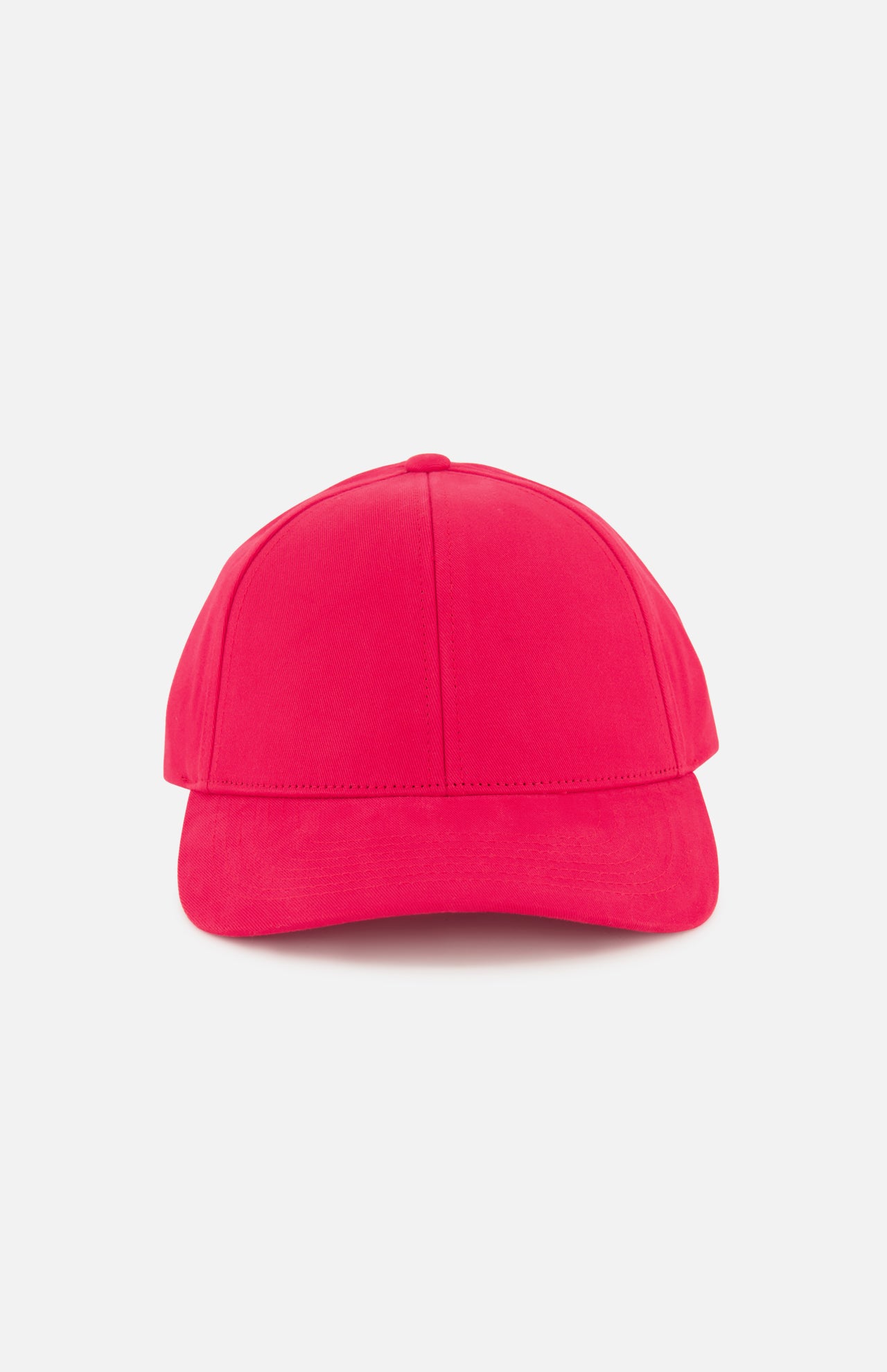 Front view of the Cotton Twill Pulse Hat by VARSITY HEADWEAR in bright red, featuring a curved brim and an adjustable back strap for a comfortable fit, displayed on a plain white background.