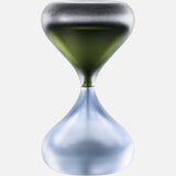 The Clessidra Sommersa Hour Glass by VENINI features a metallic dark green Murano glass top and a smooth translucent blue bottom, displayed on a plain white background.
