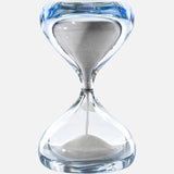 The VENINI Clessidra Sommersa Hour Glass features clear Murano glass with white sand flowing between chambers, shown against a plain white background.