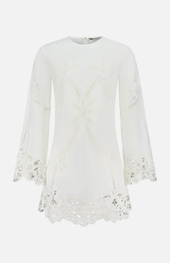 The Amberg Scalloped Lace Dress by VERONICA BEARD, crafted from a soft cotton-linen blend with Battenberg lace and floral embroidery on the sleeves and hem, is displayed against a plain white background.