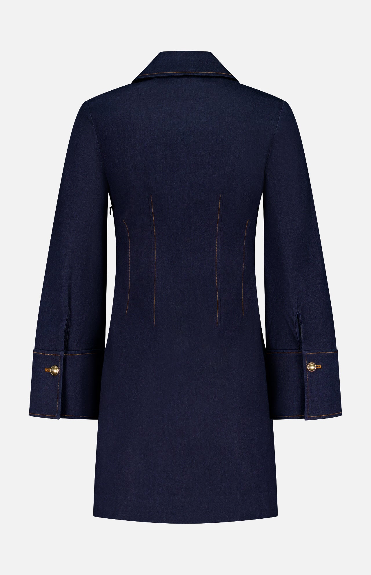 The Raymond Denim Mini Dress by VERONICA BEARD is shown from the back on a white background. This dark blue dress features long sleeves, wide cuffs, gold buttons, and visible tan stitching for a modern, structured look.