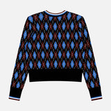 The VERONICA BEARD Sylvane Cropped Argyle Cardigan is a slim fit with blue, burgundy, and white argyle, ribbed black cuffs, waistband, and collar. Shown laid flat with the back side facing up.