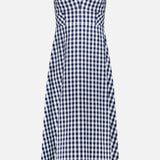 The Aila Gingham Seersucker Dress by VERONICA BEARD is a sleeveless, knee-length midi with a fitted bodice and flared skirt in classic navy and white checks.