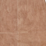 Close-up view of the VERONICA BEARD Callisian Leather Midi Skirt in beige lambskin suede, featuring smooth, soft texture, vertical seam details, and a top center back zipper.