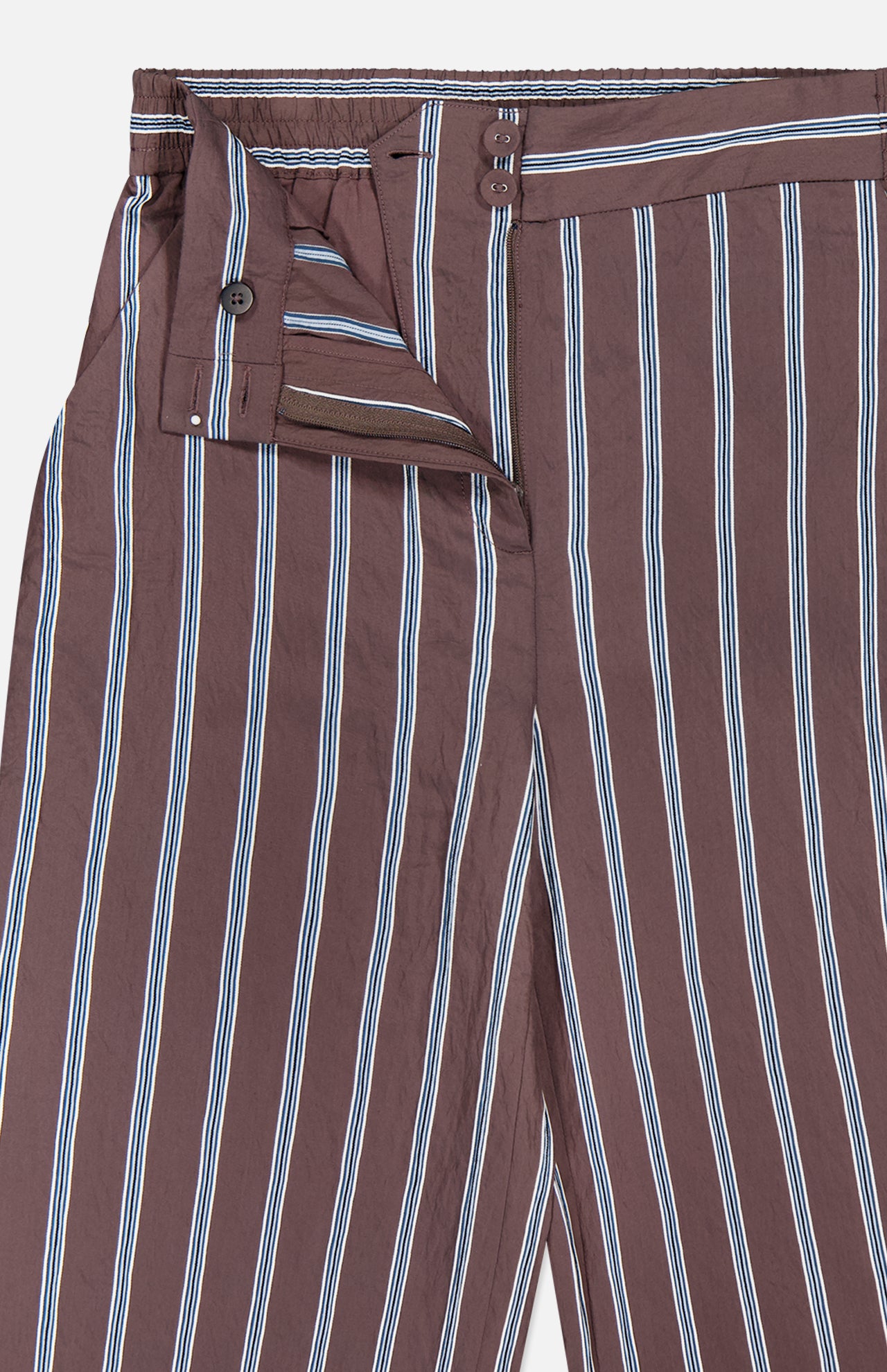 The Carraway Pant by VERONICA BEARD features a brown wide-leg design with vertical white and blue stripes, a high-rise waistband with button, hook, and zip closure, and lightweight textured fabric for added style.