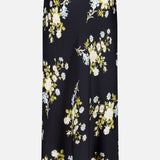 The Clover Floral Midi Skirt by VERONICA BEARD is a long, black slip skirt adorned with a floral pattern featuring white, yellow, and blue flowers with green leaves. Crafted from stretch georgette, the skirt is showcased against a plain white background.