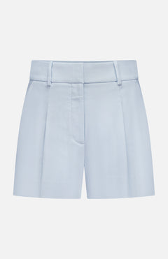 The Craig High Rise Short by VERONICA BEARD features light blue Italian cotton-blend twill, high waist, belt loops, front zipper, and crisp pleats—classic A-line shorts shown against a plain white background.