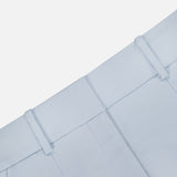 Close-up of the Craig High Rise Short by VERONICA BEARD in light blue Italian cotton-blend twill, featuring the waistband, belt loops, and upper front pockets against a plain white background.