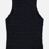 The VERONICA BEARD Ruffled Cropped Jordyn Tank is displayed flat on a white background, shown from the back. This sleeveless black tank features a textured finish and subtle micro-ruffles.
