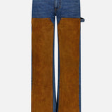 The Dylan High Rise Straight Leg Jean by VERONICA BEARD showcases blue denim in a high-rise straight-leg silhouette, accented with large brown suede panels on the front thighs and knees, as well as brown suede details on the waistband and pockets for a striking two-tone effect. Expertly crafted in the USA, these jeans blend classic style with distinctive texture and exceptional craftsmanship.