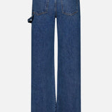 The Dylan High Rise Straight Leg Jean by VERONICA BEARD is crafted from high-rise denim in a timeless straight-leg silhouette. Seen from the back, these wide-leg blue jeans feature two rear pockets, a brown leather patch at the waistband, and a small loop detail on the side, blending classic style with a flattering fit.