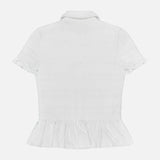 Back view of the VERONICA BEARD Ellisandra Slim Smocked Top in white, featuring a collar, subtle textured pattern, ruffled sleeve edges, and a peplum-style ruffled hem.