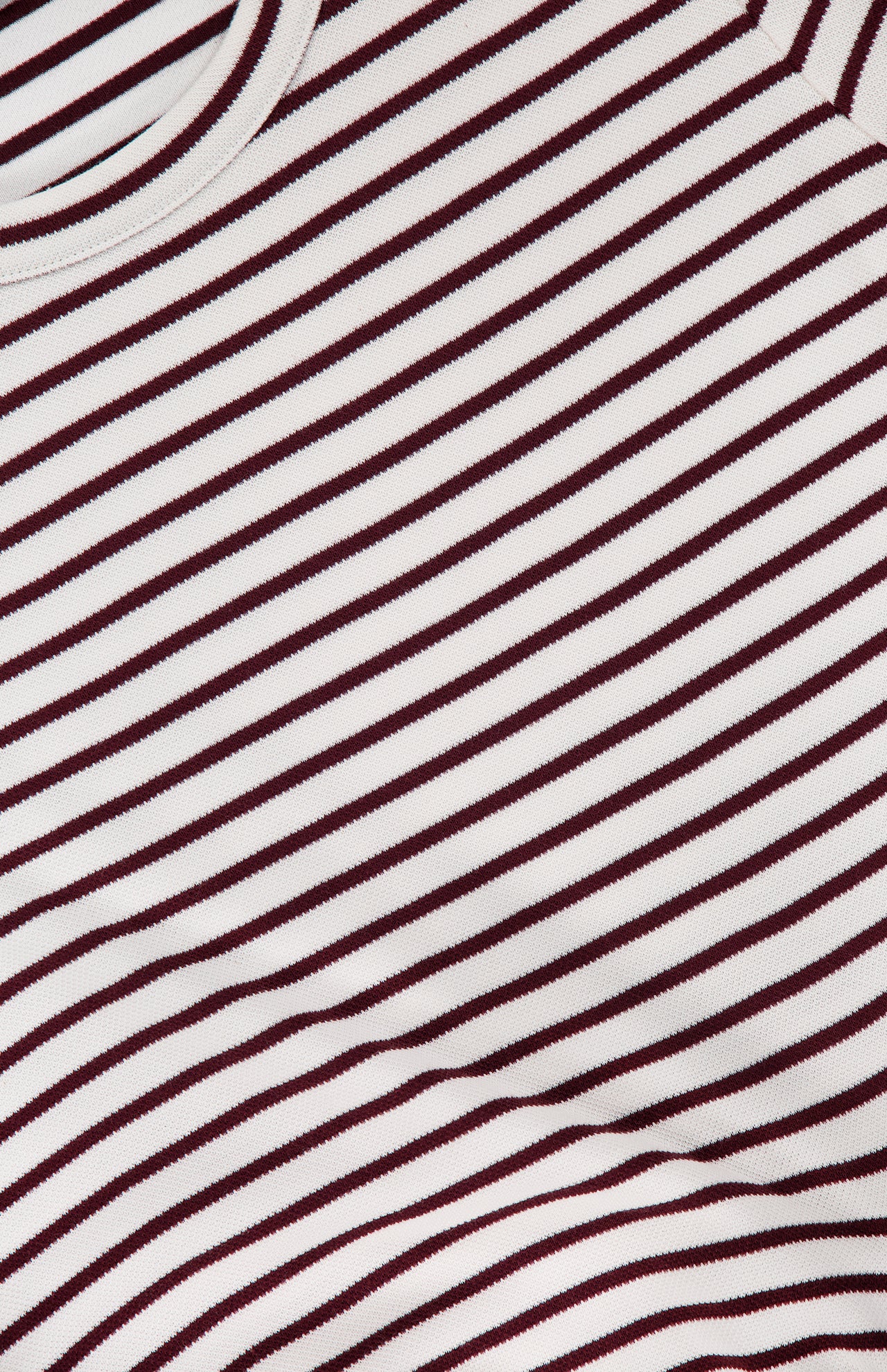 Close-up of the Elvaris Cinch Waist Mini Dress by VERONICA BEARD, featuring thin diagonal maroon stripes on a white background and part of the round neckline at the top left.