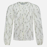 The Emiko Floral and Lace Blouse by VERONICA BEARD is an ivory cotton-silk voile long-sleeve with a prairie floral motif, round neckline, pintuck front, and puffed sleeves finished with elastic cuffs.