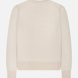 The Frankie Pearl Pin Pullover Sweater by VERONICA BEARD is displayed laid flat and viewed from the back, featuring a plain, light beige knit design with long sleeves and ribbed cuffs, hem, and neckline.