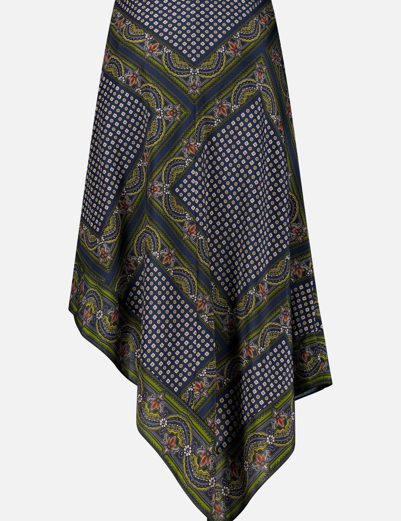 The Hartley Scarf Print Skirt by VERONICA BEARD is a silk midi skirt with a handkerchief-hem silhouette, featuring geometric and floral patterns in navy, green, and white. Asymmetric points and intricate border detailing complete this striking design.