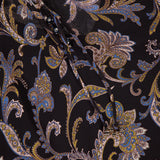 The VERONICA BEARD Silk Hickory Blouse showcases black silk georgette with blue, yellow, and beige paisley patterns, decorative swirls, leaf motifs, buttons, and a sheer overlay for a chic bohemian vibe.