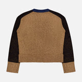 The Josiane Cardigan Sweater by VERONICA BEARD from the knitwear collection features a brown body with black sleeves, a blue neckline, and ribbed cuffs and waistband. This colorblock sweater is displayed laid flat on a white background, shown from the back.
