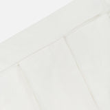 Close-up of the Marbeau Wide Leg Pant by VERONICA BEARD, highlighting its off-white hue, elegant pleats, and smooth texture against a plain white background.