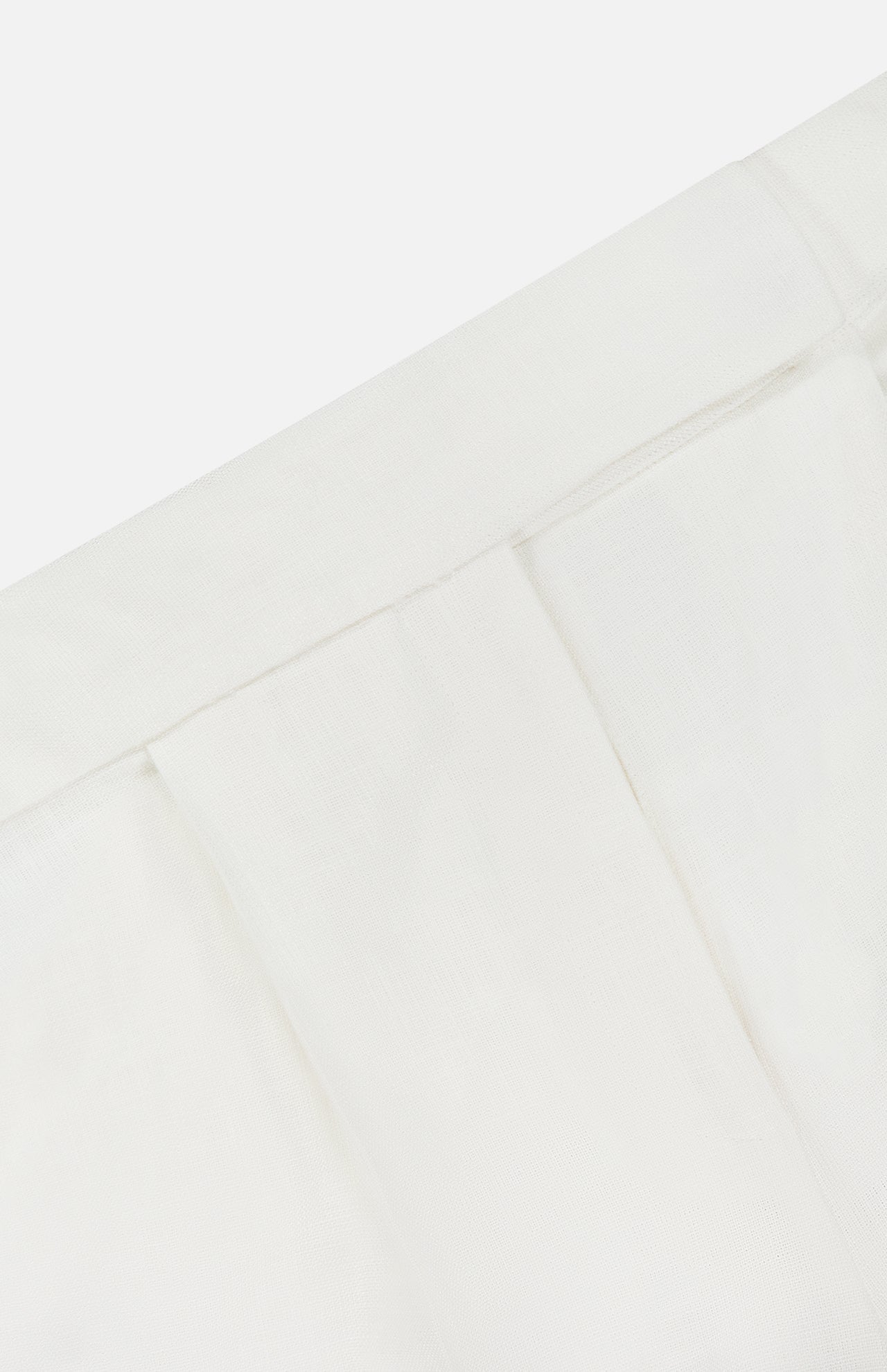 Close-up of the Marbeau Wide Leg Pant by VERONICA BEARD, highlighting its off-white hue, elegant pleats, and smooth texture against a plain white background.