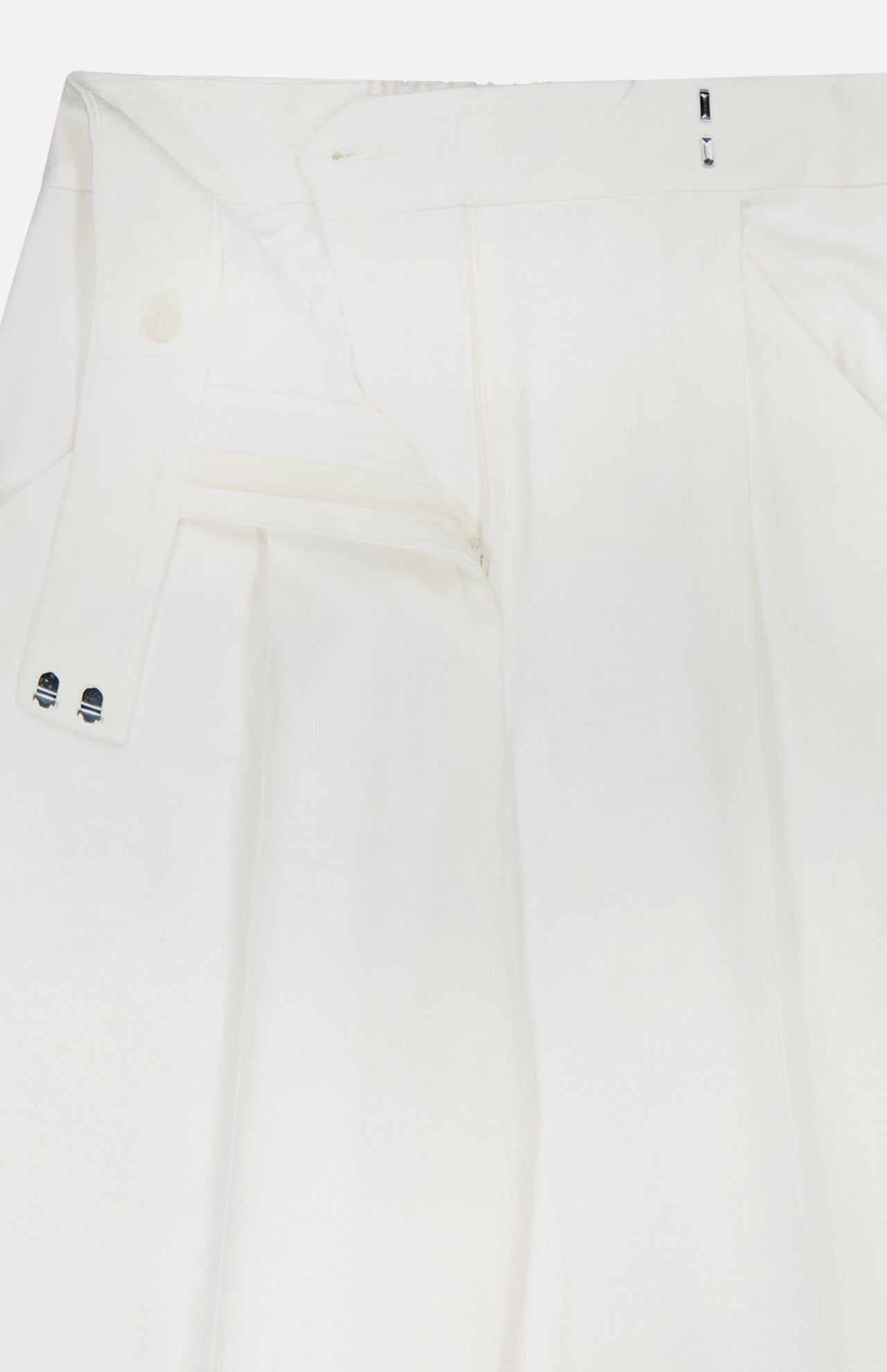 Close-up of the VERONICA BEARD Marbeau Wide Leg Pant in off-white, featuring a high-rise waist, partially unzipped and unbuttoned front, double button tab, and pleated details.