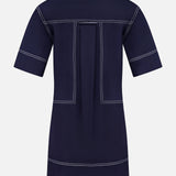The Phelix Topstitched Mini Dress by VERONICA BEARD is crafted from stretch-cotton poplin with a relaxed fit, white contrast stitching, center box pleat, collared neckline, and navy hue, shown here from the back.