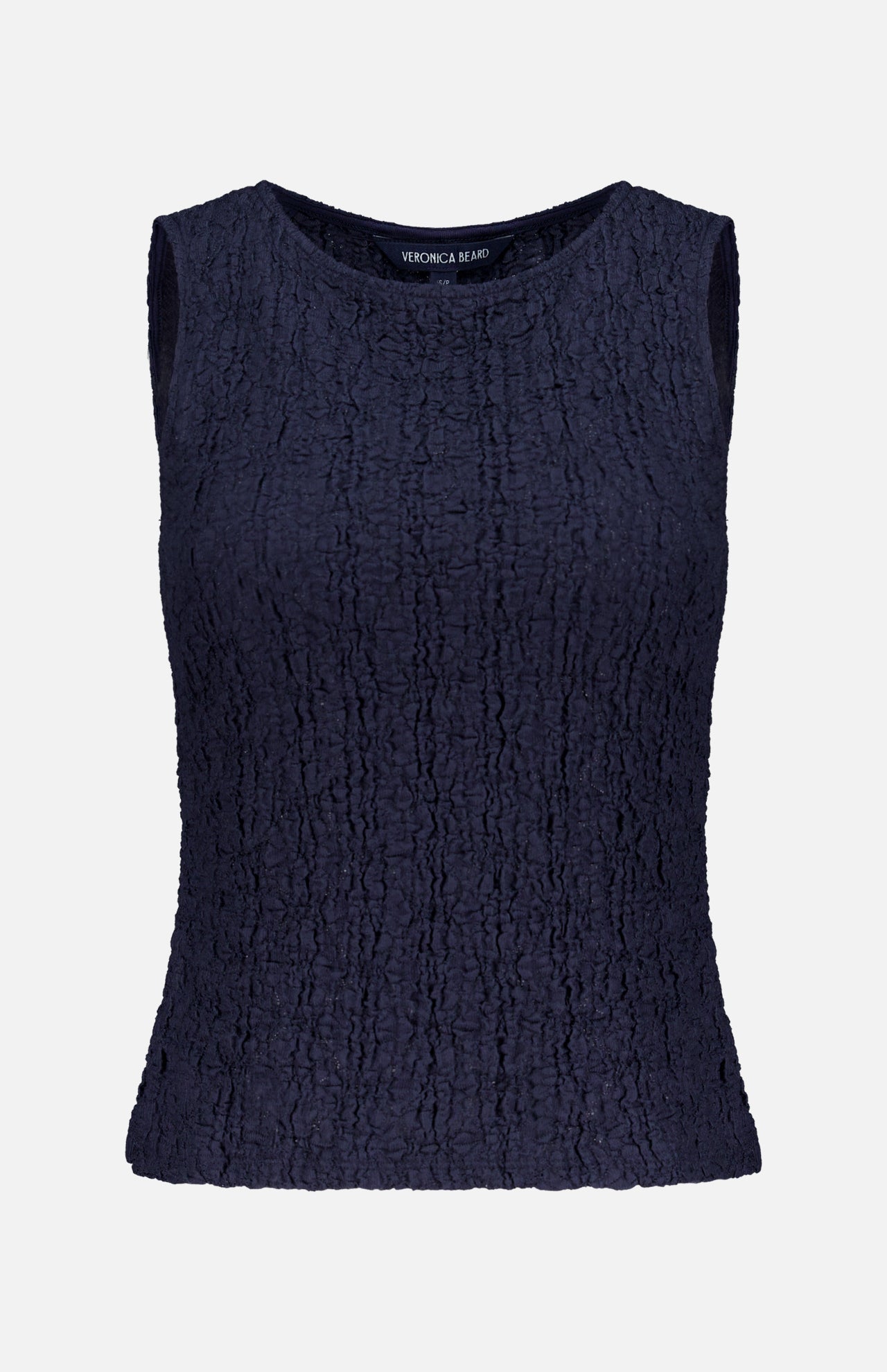 The Selah Sleeveless Stretch Tank by VERONICA BEARD is a fitted navy tank with a round neckline, crinkled texture, and delicate cotton lace details for added style.